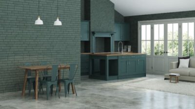 modern interior of a country house interior with dark green kitchen