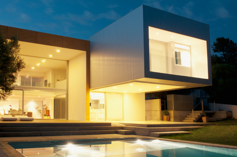 Pool outside modern house