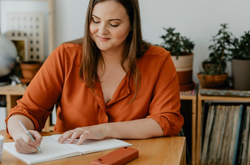 A smiling plus size woman