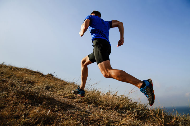 Man in a running trail in Wenatchee, WA